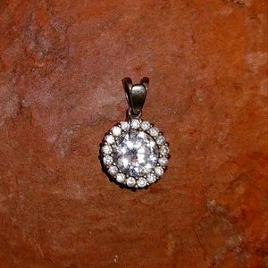 Fused Alloy Silver pendant; round diamond stones